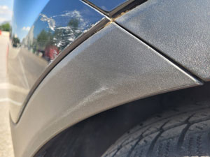 Detailaufnahme eines Schadens am Radlauf
